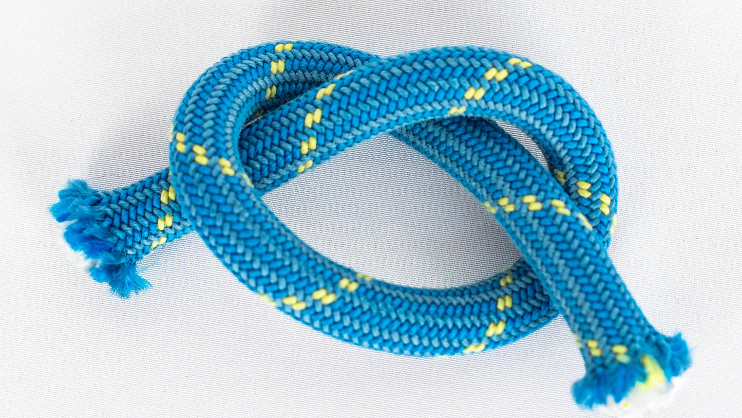Blue rope with yellow accents on a white background