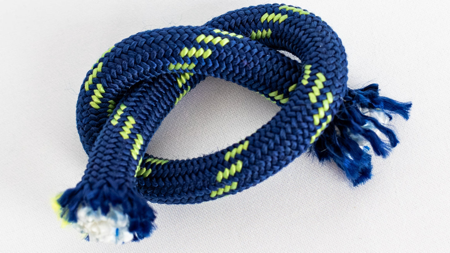 Blue and green braided rope on a white background