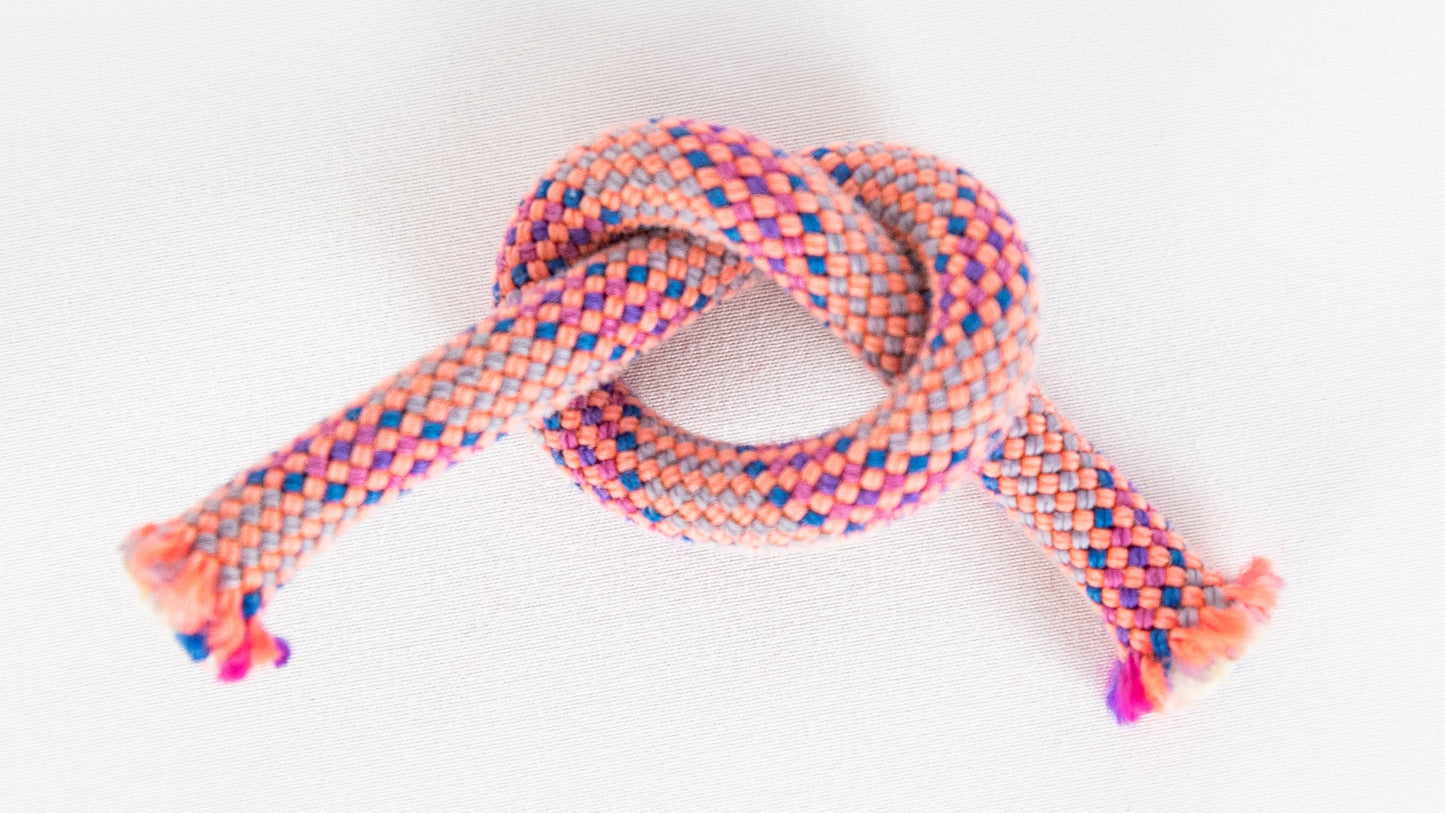 Colourful braided rope on a white background