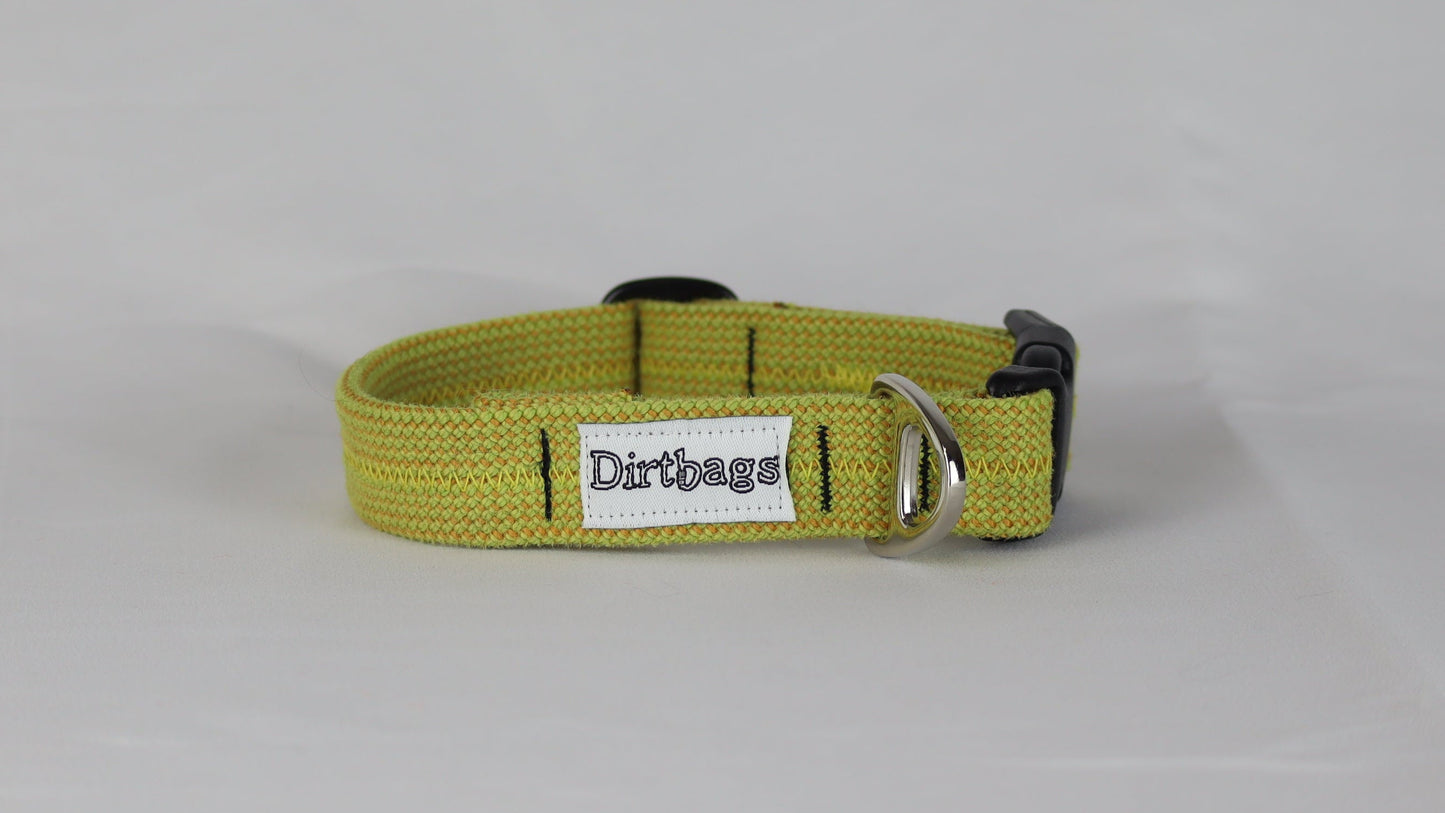 Yellow upcycled rope dog collar with a dirtbags tag on a gray background