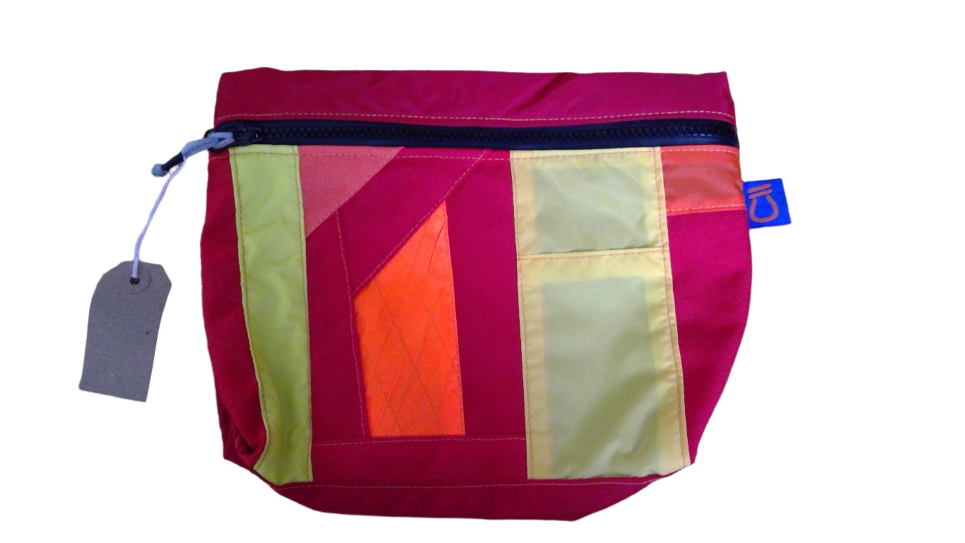 red kit bag with zip made from upcycled materials